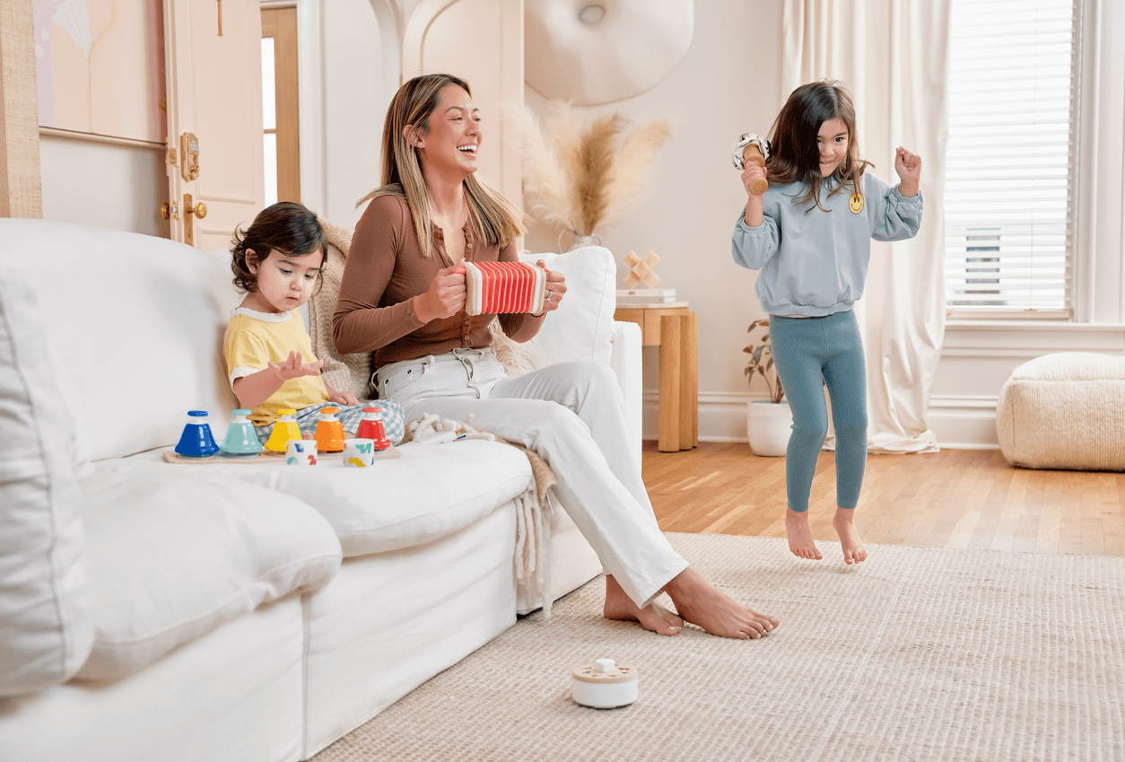 Family playing with The Music Set by Lovevery